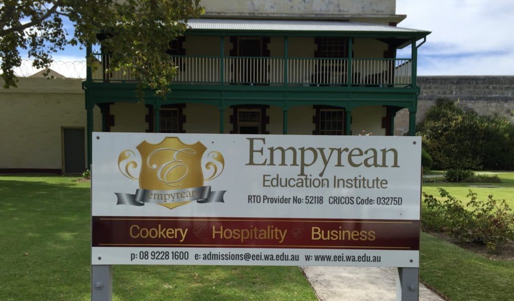 Empyrean Education Institute sign in front of building