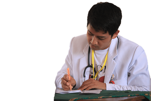 Doctor writing notes with head down and wearing a stethoscope