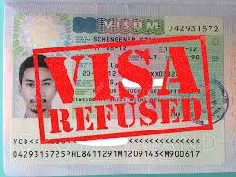Visa refusal stamp on passport