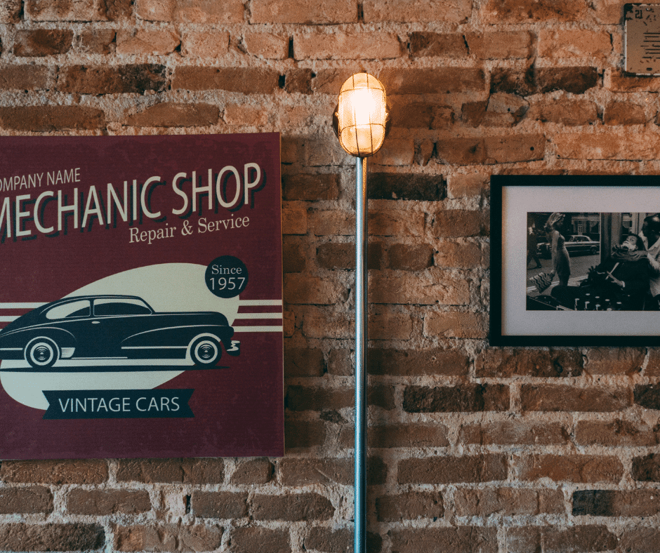 Inside mechanic shop brick wall with photos on the walls
